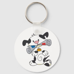 Chaveiro Cachorro com T-shirts de jornal e presentes