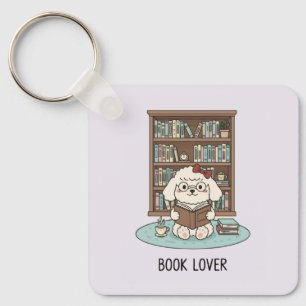 Chaveiro Cachorro de pelúcia amante de livros Poodle Tea Co
