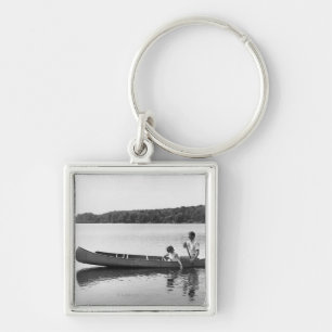 Chaveiro Casal em uma canoa