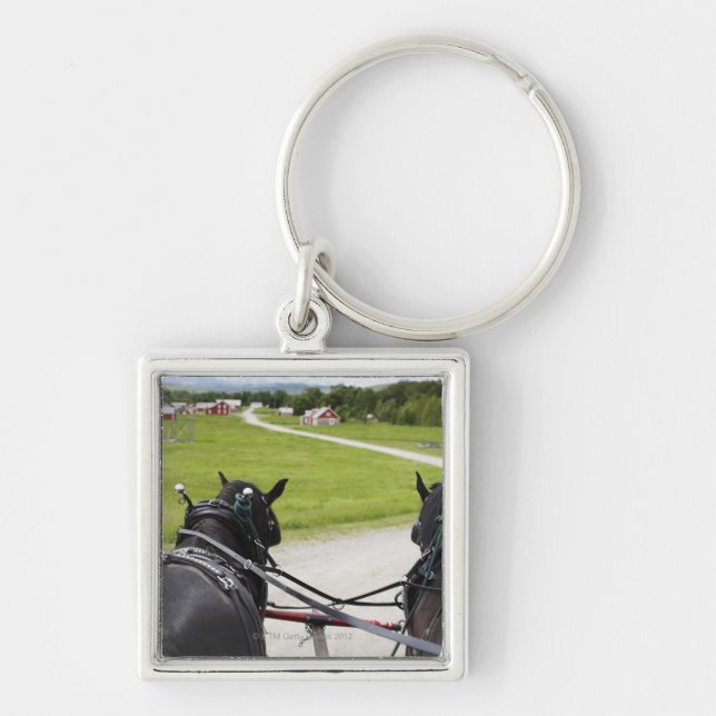 Chaveiro Cavalos de Perchon que puxam o carro contra (Frente)