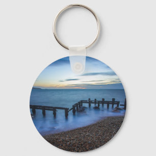 Chaveiro Céu Crepúsculo sobre o litoral e as águas-vivas