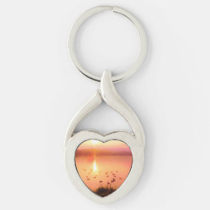 Chaveiro Coletor solar rosa e pêssego