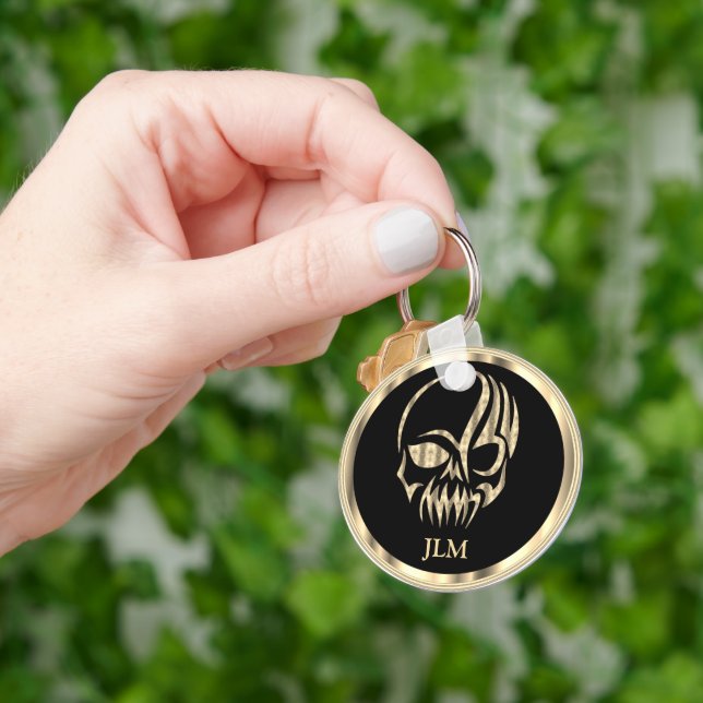 Chaveiro Crânio negro e Dourado (Mão)