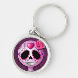 Chaveiro Crânio roxo bonito do açúcar