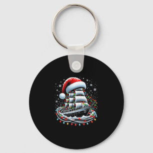 Chaveiro Cruzeiro de barco de Natal cercado por B