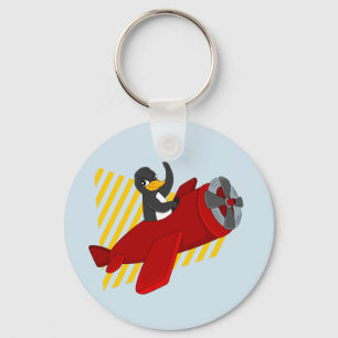 Chaveiro de desenho animado de pinguim voador