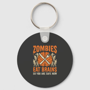 Chaveiro Desenho Vetorial de Zumbi Engraçado Comendo Cérebr