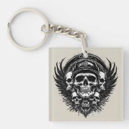 Chaveiro Design de crânio com Asas e Símbolos