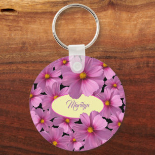 Chaveiro Design de Flor do Cosmos Roxo em um Fundo Preto