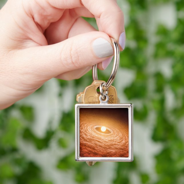 Chaveiro Disco De Material Em Torno Da Estrela Fu Orionis. (Mão)