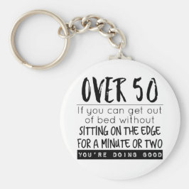 Chaveiro Diversão acima de 50 saindo da Piada da cama