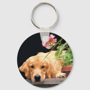Chaveiro do golden retriever com flor