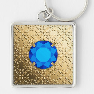 Chaveiro Dourado Damask com uma pedra de fogo