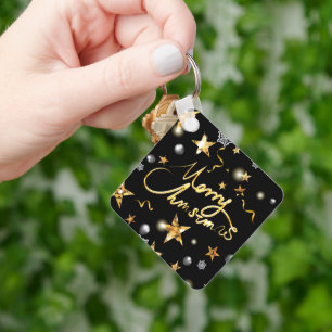 Chaveiro Dourado Natal das Estrelas do Metálico Negro