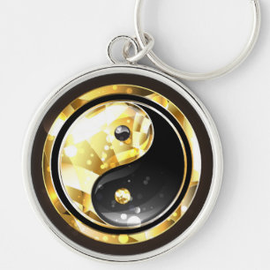 Chaveiro Dourado Yin Yang a preto