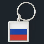 Chaveiro Drapeau Russie tricolore<br><div class="desc">Le drapeau de la Russie est composé de trois bandes horizontales: blanche,  bleue et rouge.</div>