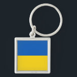 Chaveiro Drapeau Ukraine<br><div class="desc">Drapeau de l'Ukraine: Les couleurs sont associées au paysage ukrainien,  les bandes horizontales bleue et jaune symbolisent le ciel bleu sur les champs de blé.</div>
