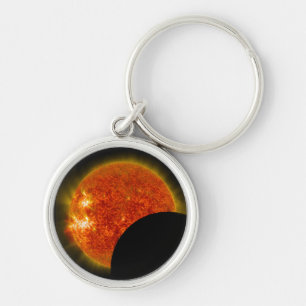 Chaveiro Eclipse solar em andamento