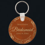Chaveiro Elegante Rust Orange & Dourada Bridesmaid Wedding<br><div class="desc">Estas chaveiros são desenhadas para oferecer como favores às damas de honra na sua festa de casamento. Eles apresentam um design simples, mas elegante, com um fundo cor laranja ou cinza queimada, letras douradas e uma borda floral de folha de alumínio com ouro de folha de alumínio. O texto diz...</div>