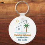 Chaveiro Empresa Imobiliária Praia Personalizável<br><div class="desc">Esta fofa companhia imobiliária tropical chaveiro apresenta uma moderna casa azul de praia com uma palmeira costeira legal e sol-ilha. Personalize este item de marketing com o seu agente e o nome de negócios real para comprar clientes domésticos ao longo da costa.</div>