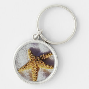 Chaveiro Estrela do mar em uma toalha