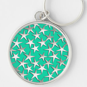 Chaveiro Estrelas prateadas na turquesa