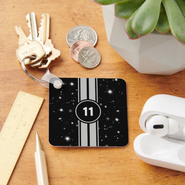 Chaveiro Estrelo de faixas de corridas pretas e prateadas (Mesa)