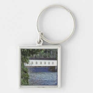 Chaveiro EUA, Oregon. Um apanhador atravessando o