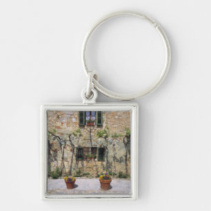 Chaveiro Europa, Itália, Monteriggioni. Uma casa de pedra é