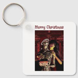 Chaveiro Feliz Natal. Esqueleto engraçado com mulher