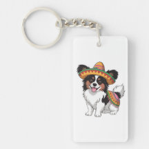 Fiesta Papillon Dog Vestindo Sombrero e Sarape