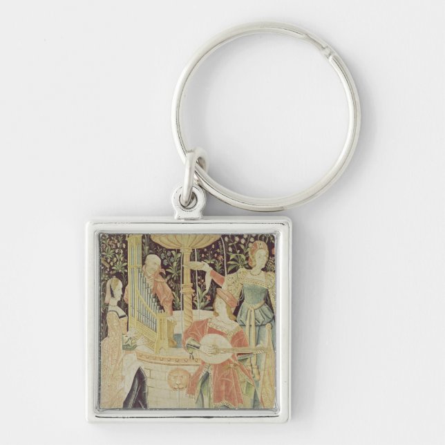 Chaveiro Figuras em torno de uma fonte (Frente)