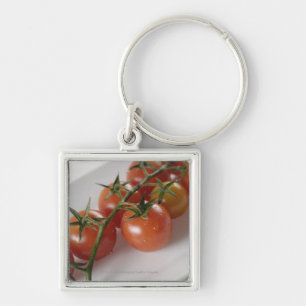 Chaveiro Fim-acima dos tomates em uma bandeja
