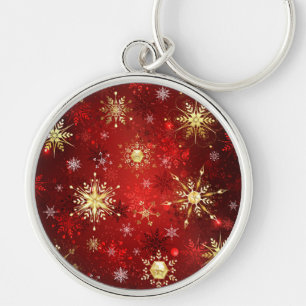 Chaveiro Flocos de neve do Ouro de Natal em Fundo Vermelho