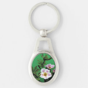 Chaveiro flores silvestres de rosa rosa em verde.