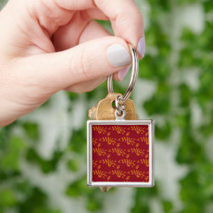 Chaveiro Folhas do ramo da silhueta laranja em vermelho