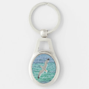 Chaveiro Gaivota sobre o mar