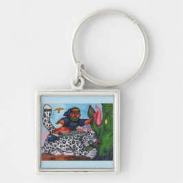 Chaveiro garoto fantasia andando de gato brigando dragão e 