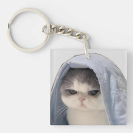 Chaveiro Gato bonito com cobertor