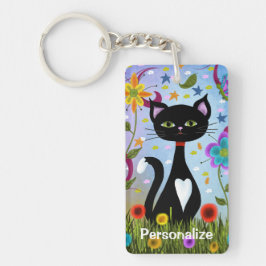 Chaveiro Gato de Smoking Preto e Branco em um Jardim Person