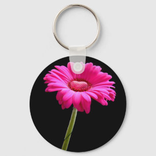 Chaveiro Gerbera cor-de-rosa com coração no fundo preto
