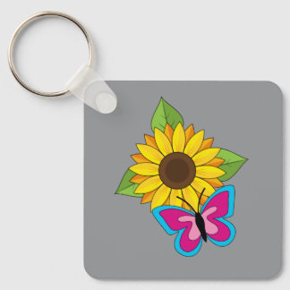 Chaveiro Girassol Amarelo e Borboleta Azul Rosa