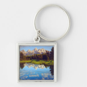 Chaveiro Grand Tetons refletidos no rio Snake