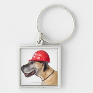 Chaveiro Great dane que veste um capacete vermelho da