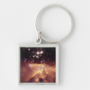 Chaveiro Guerra e nebulosa Pismis 24 da paz