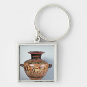 Chaveiro Hydra que descreve a partida de um guerreiro