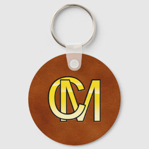 Chaveiro iniciaiss C e M de ouro