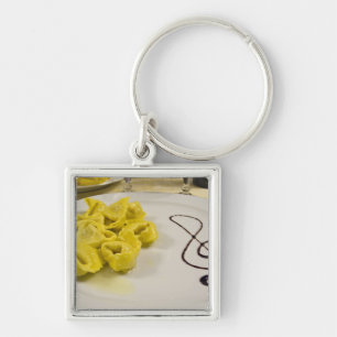 Chaveiro Itália, Cento. Um prato de tortellini de queijo