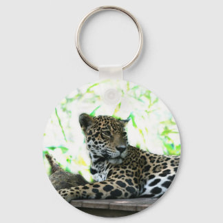 Chaveiro Jaguar olhando sobre o ombro verde aplicado