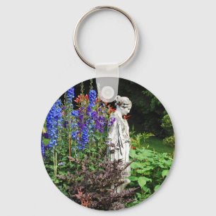 Chaveiro Jardim de flores e estátua de delfinium azuis